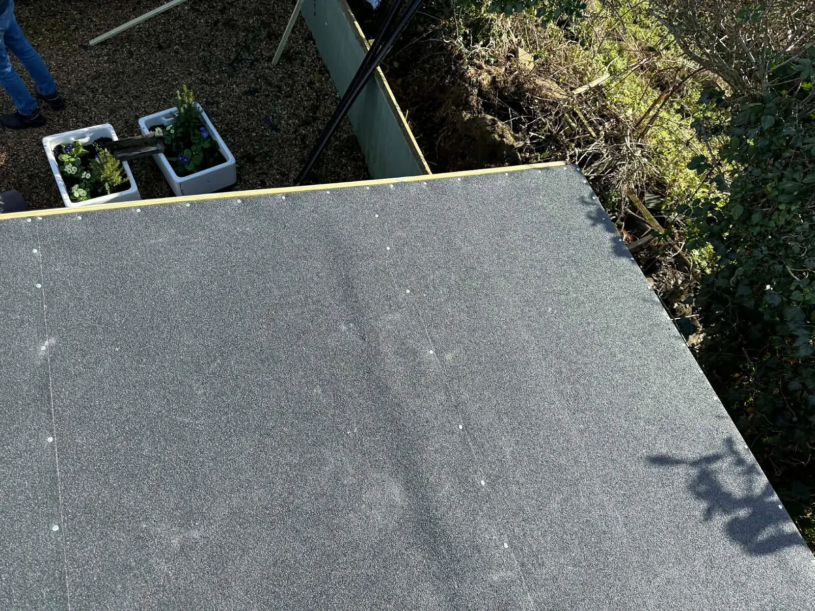 Close-up of re-felted shed roof – Fines Landscaping, West Norfolk