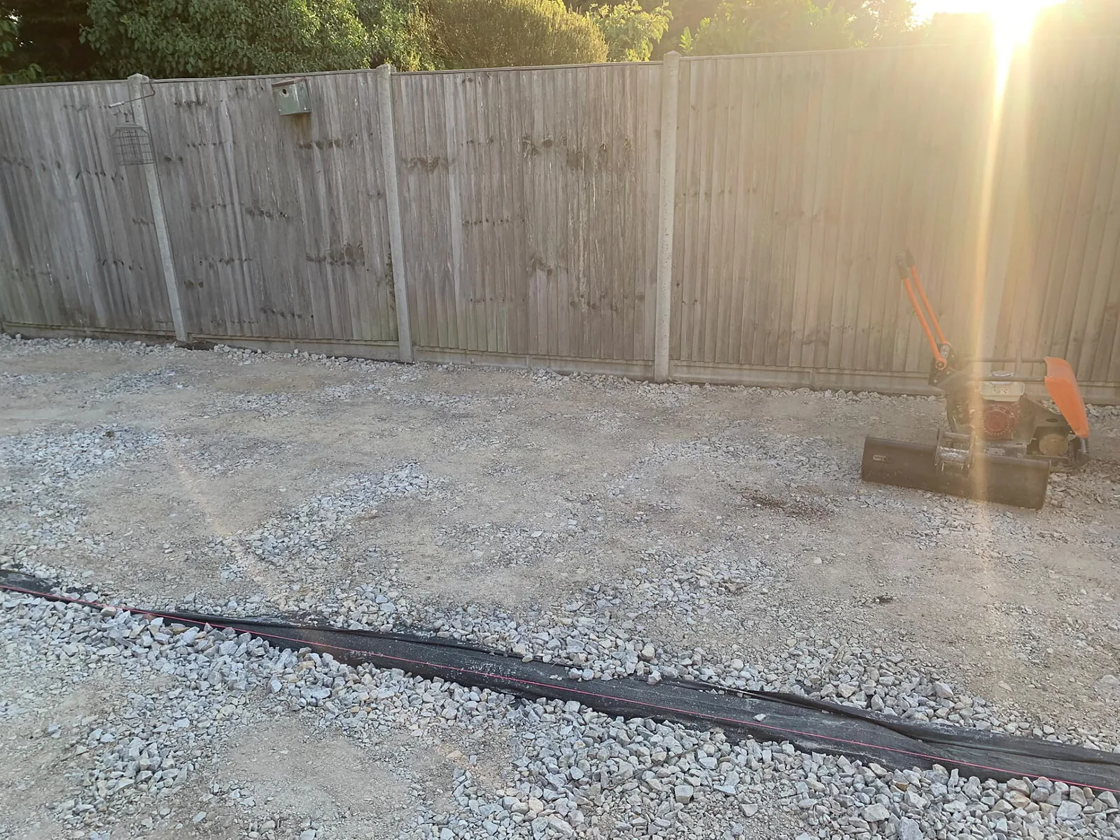 Compacted hardcore sub-base laid after excavation – Fines Landscaping, West Norfolk