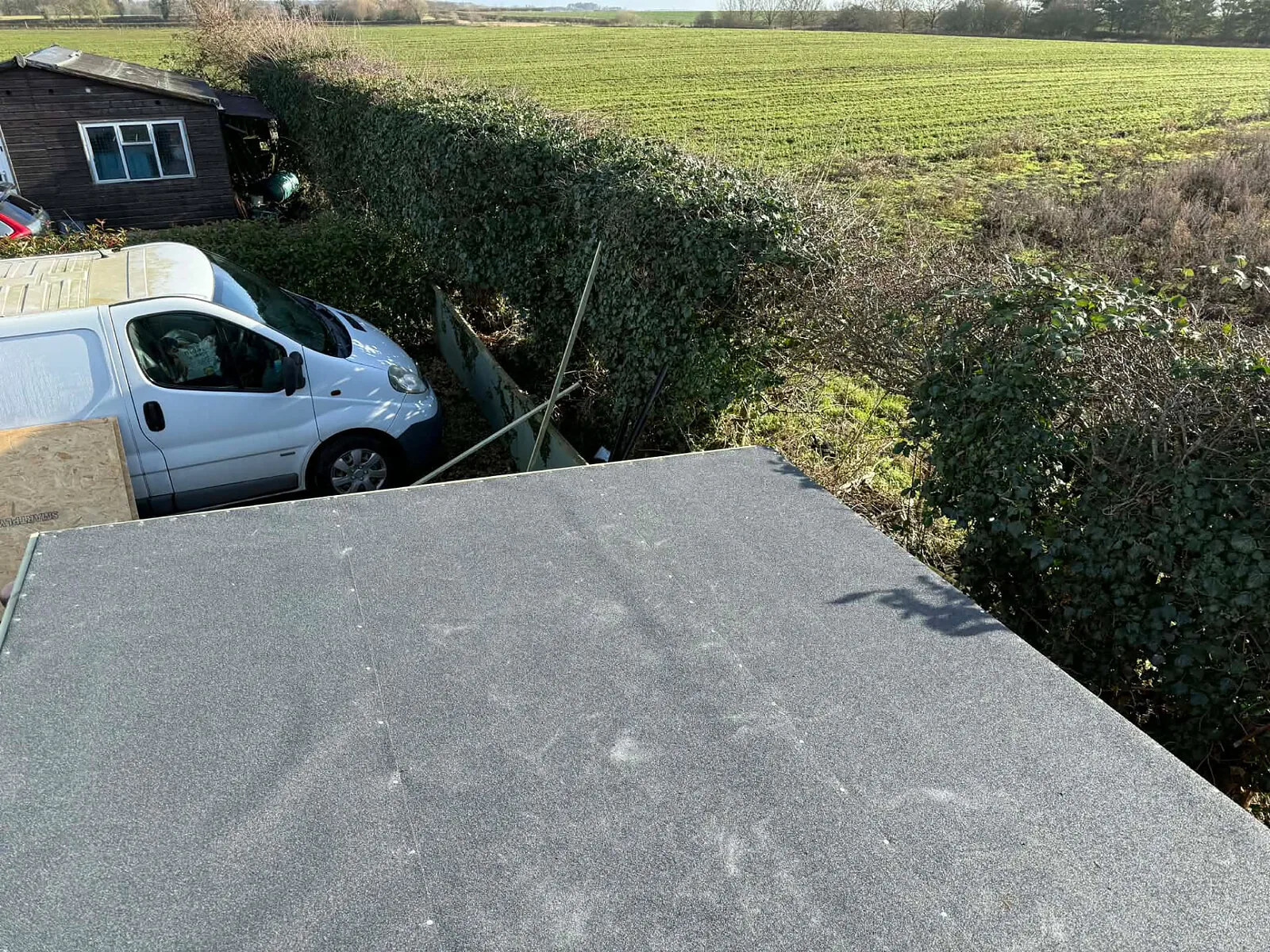 New roofing felt fitted to a garden shed – Fines Landscaping, West Norfolk