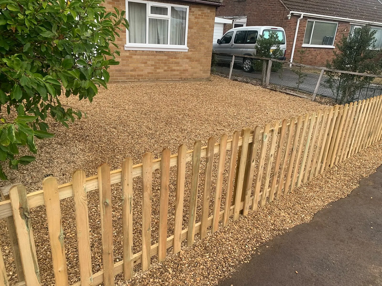 Picket fence enclosing a gravel front garden – Fines Landscaping, West Norfolk
