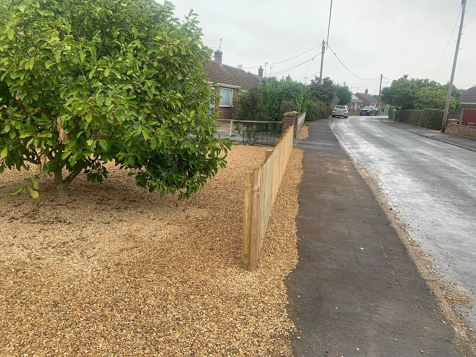 Timber picket fence installed along a front garden by the road – Fines Landscaping, West Norfolk